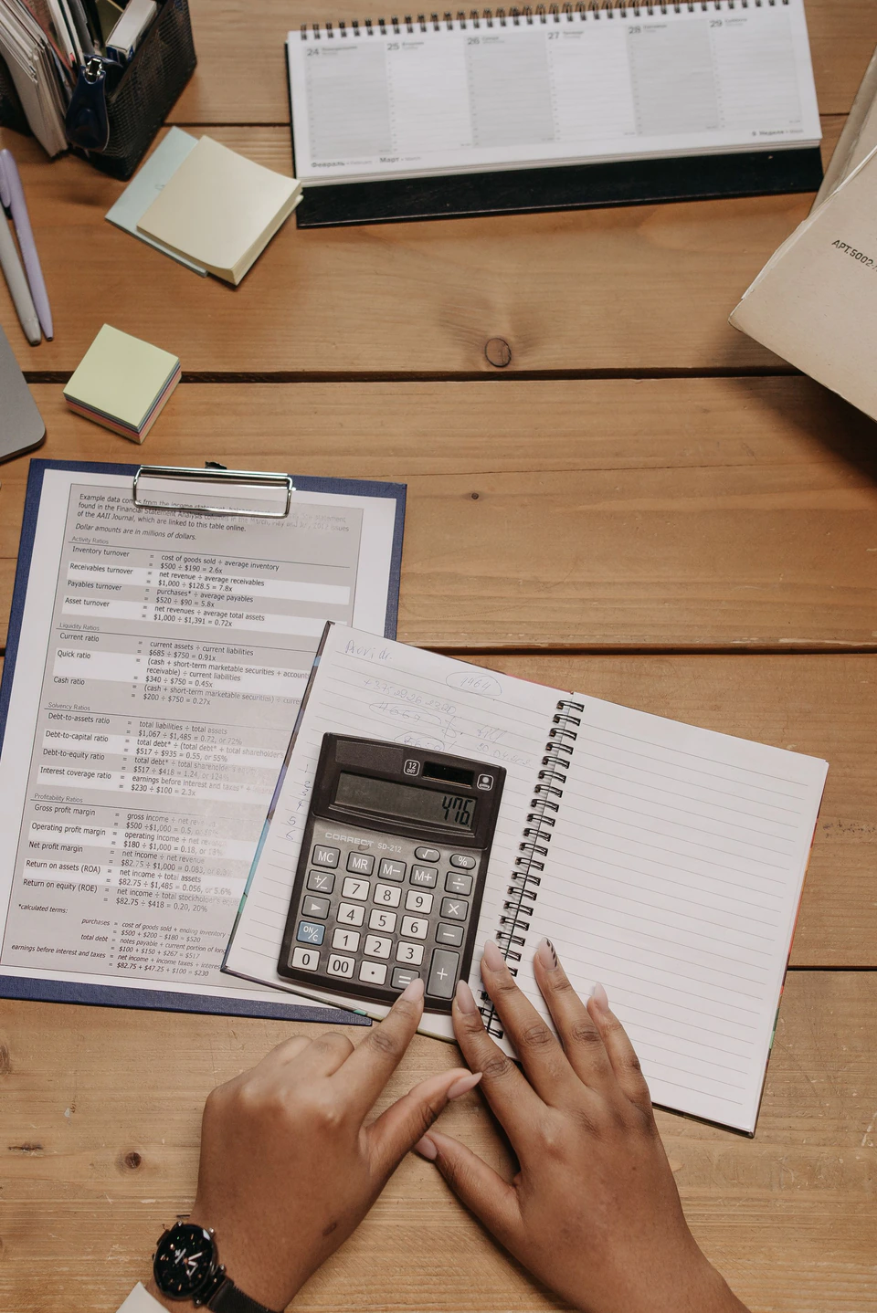 Paperwork and a calculator on a desk